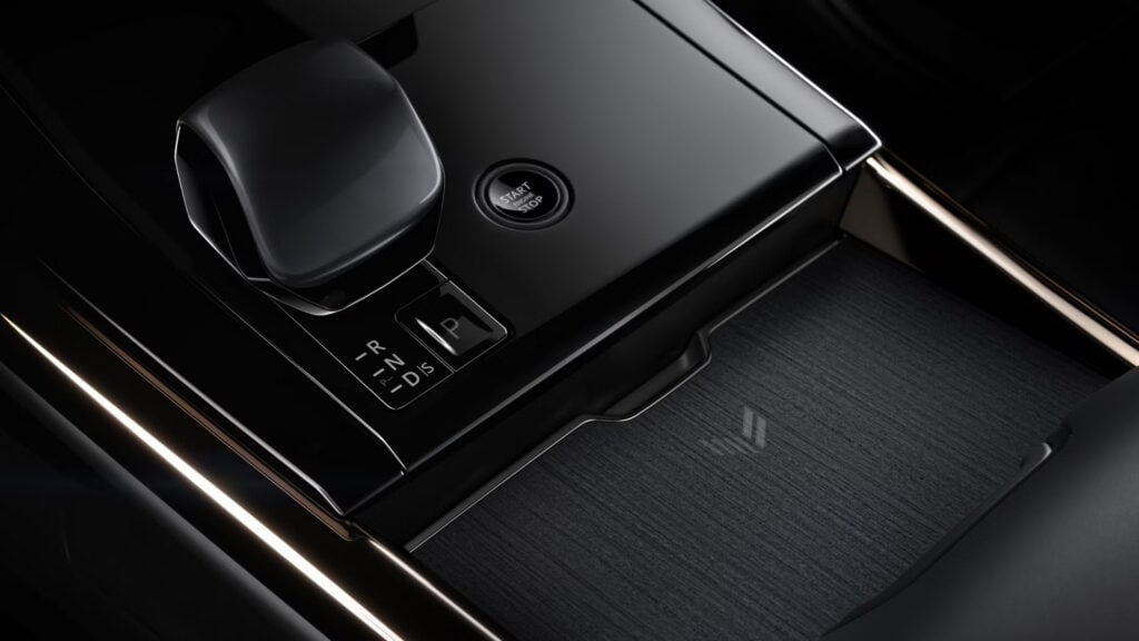 Sleek Land Rover gear shift and dashboard in a luxury vehicle at Coventry North Land Rover.