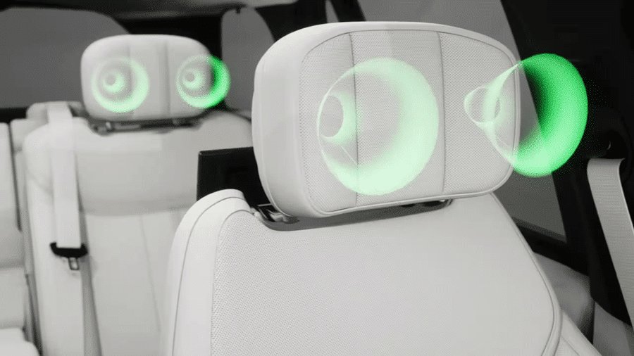 2026 Land Rover Range Rover interior, white leather seat headrests with green sound waves